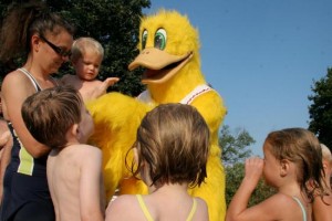 Swimmers Surround the Duck