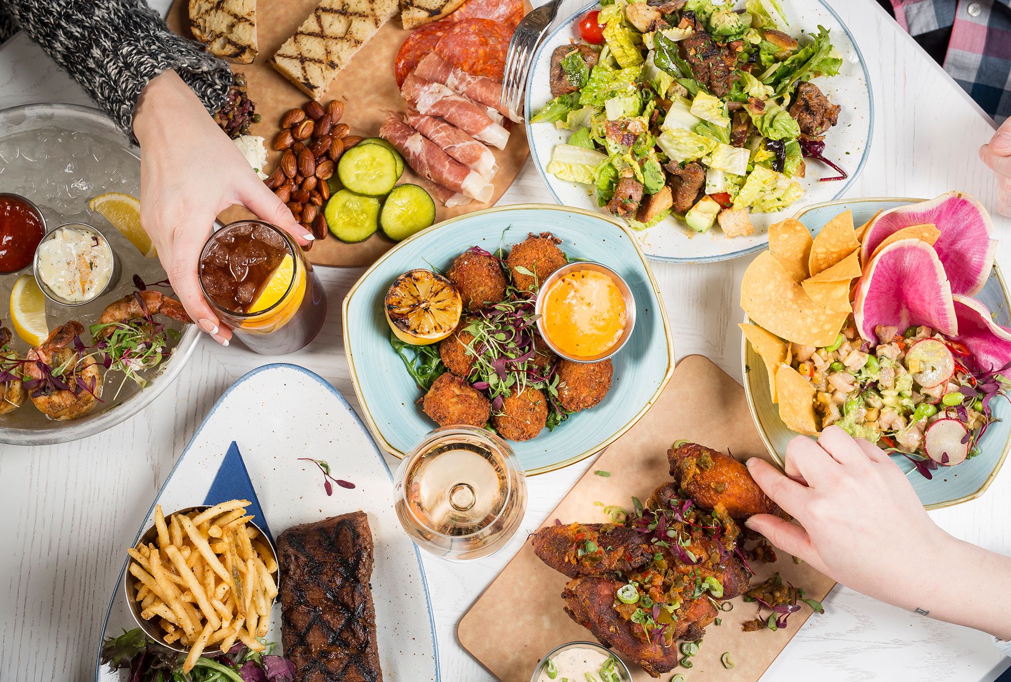 Hampton Social South Barrington Offering New Year's Eve Cocktail Kits